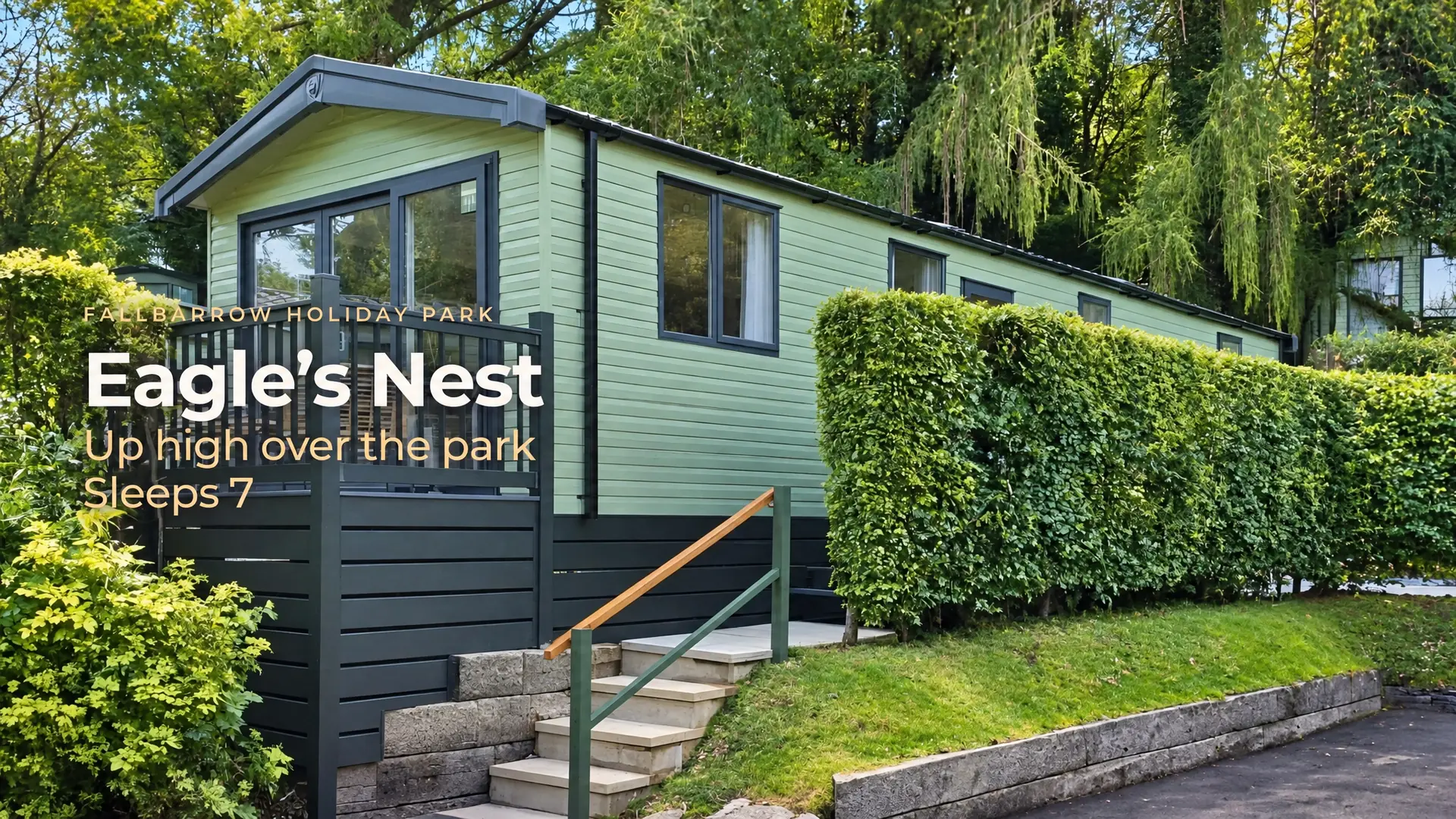 A frame from a VideoWorks film for Bowness Retreats: a sage-green holiday lodge with the on-screen title “Eagle’s Nest”, Fallbarrow Holiday Park